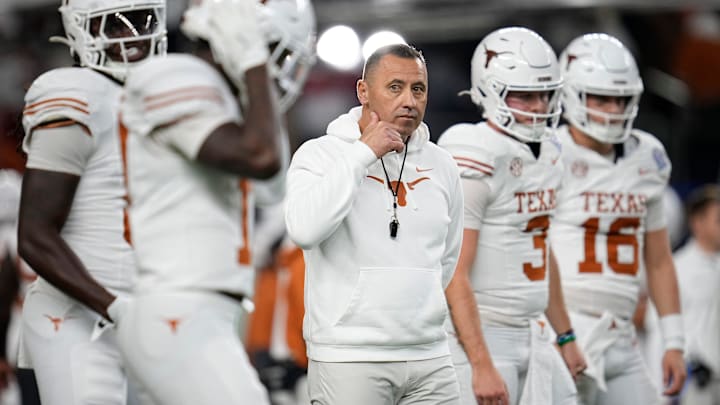 Texas Longhorns head coach Steve Sarkisian leads warm ups prior to the Cotton Bowl Classic College Football Playoff semifinal game between the Ohio State Buckeyes and the Texas Longhorns at AT&T Stadium in Arlington, Texas on Jan. 10, 2025. Texas Longhorns head coach Steve Sarkisian leads warm ups prior to the Cotton Bowl Classic College Football Playoff semifinal game between the Ohio State Buckeyes and the Texas Longhorns at AT&T Stadium in Arlington, Texas on Jan. 10, 2025.