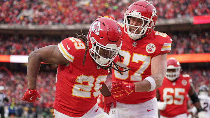  Kansas City Chiefs running back Kareem Hunt (29) celebrates with tight end Travis Kelce (87) after scoring a touchdown against the Houston Texans during the first half of a 2025 AFC divisional round game at GEHA Field at Arrowhead Stadium.