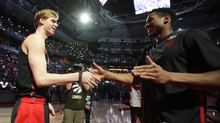 Mar 15, 2024; Toronto, Ontario, CAN; Toronto Raptors guard Gradey Dick (left) and guard Ochai Agbaji (right) during player introductions before a game against the Orlando Magic at Scotiabank Arena. Mandatory Credit: John E. Sokolowski-USA TODAY Sports