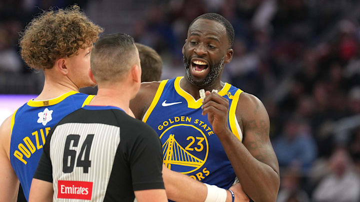 Dec 25, 2024; San Francisco, California, USA; Golden State Warriors forward Draymond Green (23) argues with referee Justin Van Duyne (64) after receiving a technical foul during the second quarter against the Los Angeles Lakers at Chase Center. Mandatory Credit: Darren Yamashita-Imagn Images