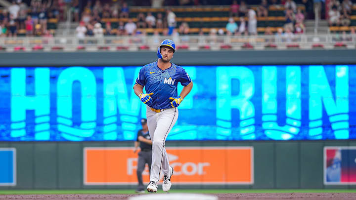 Aug 8, 2025; Minneapolis, Minnesota, USA; Minnesota Twins outfielder Matt Wallner (38) hits a home run against the Kansas City Royals in the first inning at Target Field. Mandatory Credit: Brad Rempel-Imagn Images