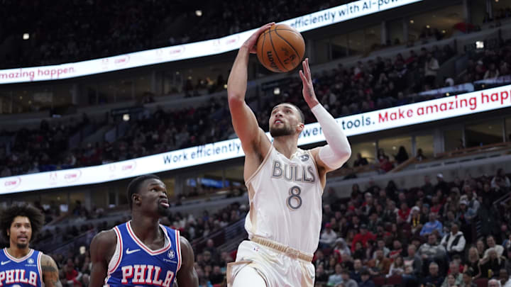 Jan 25, 2025; Chicago, Illinois, USA; Chicago Bulls guard Zach LaVine (8) shoots against Philadelphia 76ers