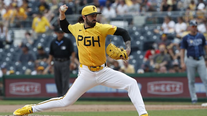 Jun 23, 2024; Pittsburgh, Pennsylvania, USA;  Pittsburgh Pirates relief pitcher Colin Holderman (35) pitches against the Tampa Bay Rays during the eighth inning at PNC Park. Mandatory Credit: Charles LeClaire-Imagn Images