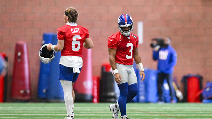 Jun 17, 2025; East Rutherford, NJ, USA; New York Giants quarterback Jaxson Dart (6) and quarterback Russell Wilson (3) interact during minicamp at Quest Diagnostics Training Center. Mandatory Credit: John Jones-Imagn Images Jun 17, 2025; East Rutherford, NJ, USA; New York Giants quarterback Jaxson Dart (6) and quarterback Russell Wilson (3) interact during minicamp at Quest Diagnostics Training Center. Mandatory Credit: John Jones-Imagn Images