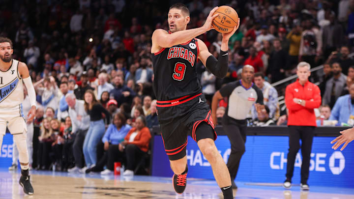 Dec 26, 2024; Atlanta, Georgia, USA; Chicago Bulls center Nikola Vucevic (9) handles the ball against the Atlanta Hawks in the fourth quarter at State Farm Arena. Mandatory Credit: Brett Davis-Imagn Images