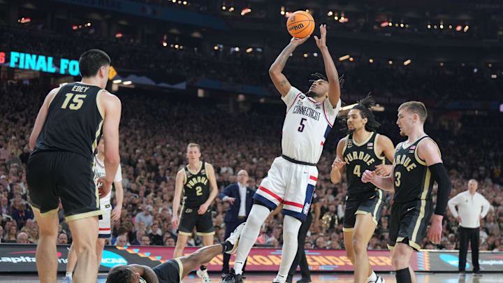 Apr 8, 2024; Glendale, AZ, USA;  Connecticut Huskies guard Stephon Castle (5) shoots against the