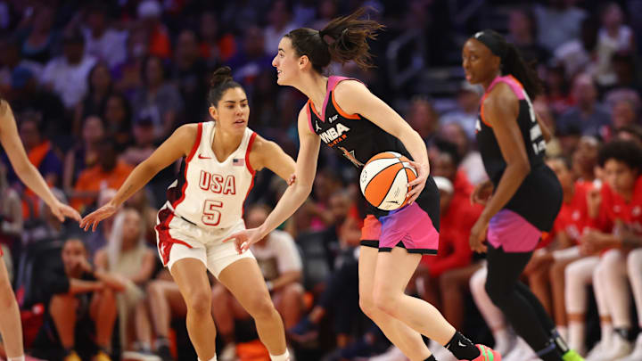 Jul 20, 2024; Phoenix, AZ, USA; Team WNBA guard Caitlin Clark (22) against USA Women's National Team player Kelsey Plum (5) at Footprint Center. Mandatory Credit: Mark J. Rebilas-Imagn Images Jul 20, 2024; Phoenix, AZ, USA; Team WNBA guard Caitlin Clark (22) against USA Women's National Team player Kelsey Plum (5) at Footprint Center. Mandatory Credit: Mark J. Rebilas-Imagn Images