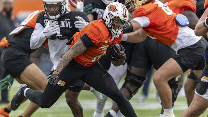 Jan 30, 2025; Mobile, AL, USA; National team running back Ollie Gordon II of Oklahoma State (0) runs through drills during Senior Bowl practice for the National team at Hancock Whitney Stadium. Mandatory Credit: Vasha Hunt-Imagn Images Jan 30, 2025; Mobile, AL, USA; National team running back Ollie Gordon II of Oklahoma State (0) runs through drills during Senior Bowl practice for the National team at Hancock Whitney Stadium. Mandatory Credit: Vasha Hunt-Imagn Images