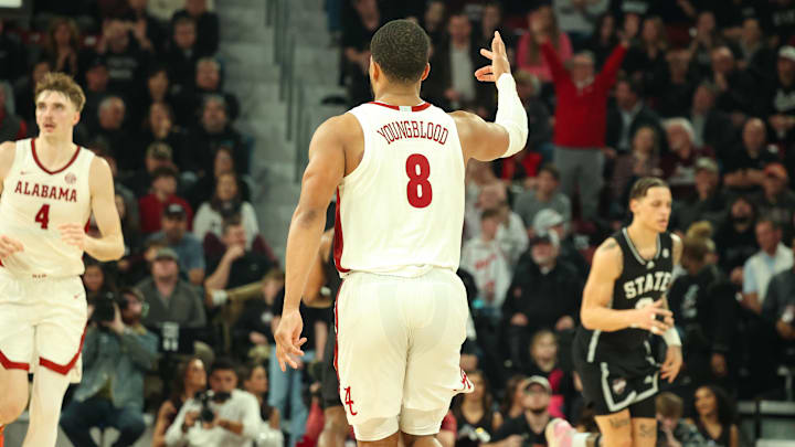 Jan 29, 2025; Starkville, Mississippi, USA; Alabama Crimson Tide guard Chris Youngblood (8) reacts after a three point basket against the Mississippi State Bulldogs during the second half at Humphrey Coliseum. Mandatory Credit: Wesley Hale-Imagn Images