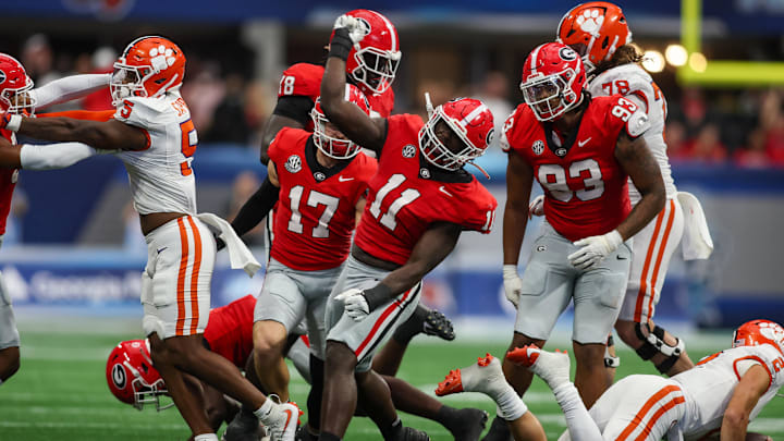 Aug 31, 2024; Atlanta, Georgia, USA; Georgia Bulldogs linebacker Jalon Walker (11) reacts after a tackle against the Clemson Tigers in the third quarter at Mercedes-Benz Stadium. Mandatory Credit: Brett Davis-Imagn Images
