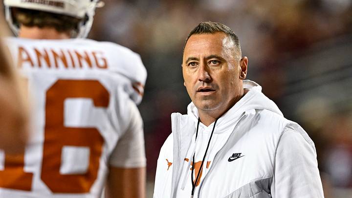 Nov 30, 2024; College Station, Texas, USA; Texas Longhorns head coach Steve Sarkisian speaks with quarterback Arch Manning (16) during warm ups against the Texas A&M Aggies at Kyle Field. Mandatory Credit: Maria Lysaker-Imagn Images Nov 30, 2024; College Station, Texas, USA; Texas Longhorns head coach Steve Sarkisian speaks with quarterback Arch Manning (16) during warm ups against the Texas A&M Aggies at Kyle Field. Mandatory Credit: Maria Lysaker-Imagn Images