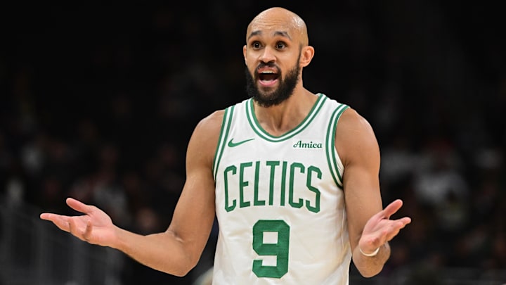 Dec 11, 2025; Milwaukee, Wisconsin, USA;  Boston Celtics guard Derrick White (9) reacts in the third quarter against the Milwaukee Bucks at Fiserv Forum. Mandatory Credit: Benny Sieu-Imagn Images