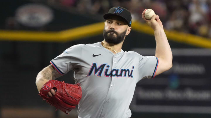 May 26, 2024; Phoenix, Arizona, USA; Miami Marlins pitcher Tanner Scott (66) throws against the Arizona Diamondbacks in the ninth inning at Chase Field.