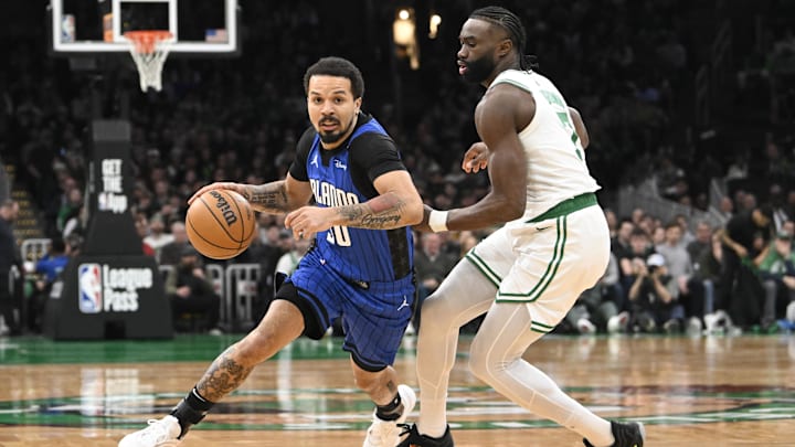 Orlando Magic guard Cole Anthony (50) drives to the basket against Boston Celtics guard Jaylen Brown (7) during the first half at TD Garden.
