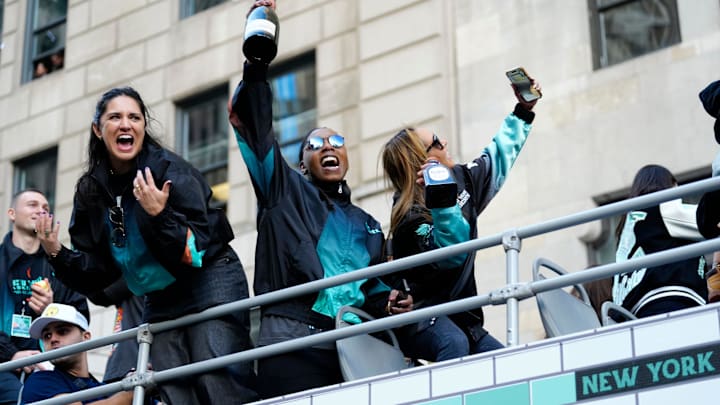 New York Liberty players are shown on a float during the ticker-tape parade, Thursday, October 24, 2024, in Manhattan.