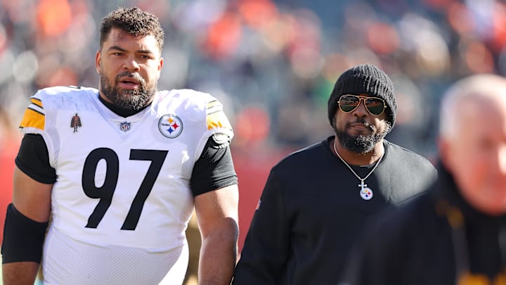 Dec 1, 2024; Cincinnati, Ohio, USA;  Pittsburgh Steelers defensive tackle Cameron Heyward (97) and head coach Mike Tomlin before the game against the Cincinnati Bengals at Paycor Stadium. Mandatory Credit: Joseph Maiorana-Imagn Images