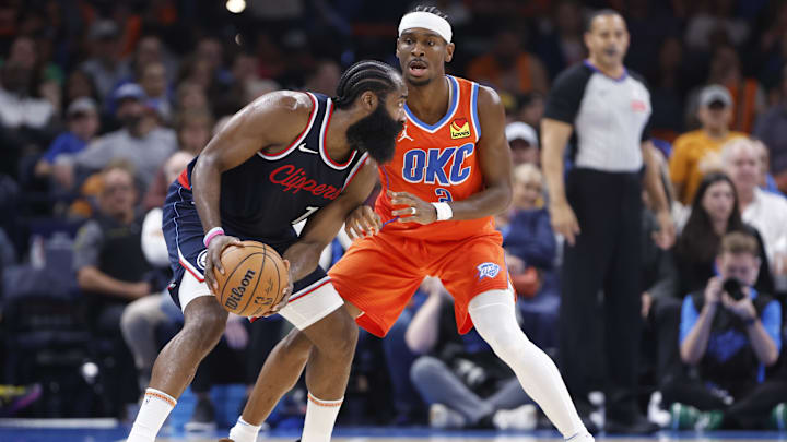 James Harden guarded by Shai Gilgeous-Alexander