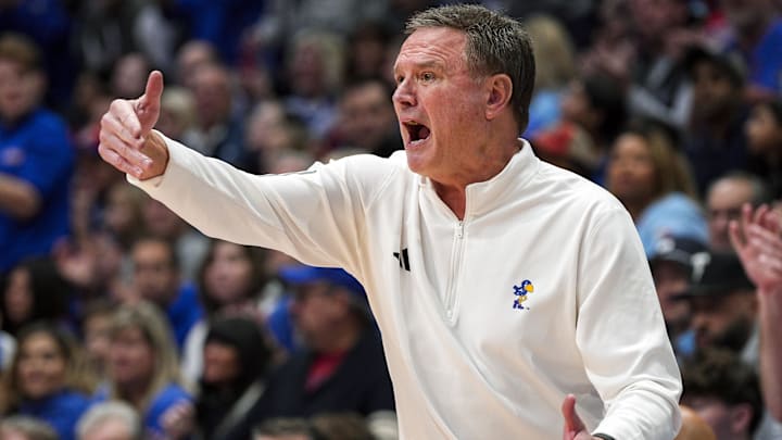 Dec 31, 2024; Lawrence, Kansas, USA; Kansas Jayhawks head coach Bill Self reacts during the second half against the West Virginia Mountaineers at Allen Fieldhouse. Mandatory Credit: Jay Biggerstaff-Imagn Images