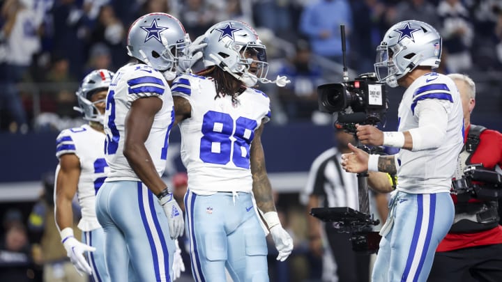 Dec 4, 2022; Arlington, Texas, USA;  Dallas Cowboys wide receiver CeeDee Lamb (88) celebrates with quarterback Dak Prescott (4) after scoring a touchdown during the first quarter against the Indianapolis Colts at AT&T Stadium. Mandatory Credit: Kevin Jairaj-USA TODAY Sports
