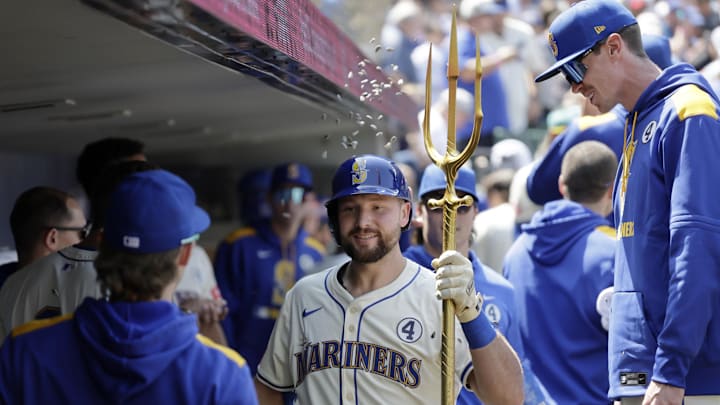 Jun 1, 2025; Seattle, Washington, USA; Seattle Mariners catcher Cal Raleigh (29) celebrates with the trident on a solo home run against the Minnesota Twins during the seventh inning at T-Mobile Park. Mandatory Credit: John Froschauer-Imagn Images