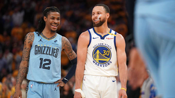 Apr 15, 2025; San Francisco, California, USA; Memphis Grizzlies guard Ja Morant (12) talks with Golden State Warriors guard Stephen Curry (30) in between free throw by Curry in the fourth quarter at the Chase Center. Mandatory Credit: Cary Edmondson-Imagn Images