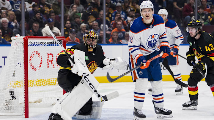 Nov 6, 2023; Vancouver, British Columbia, CAN; Vancouver Canucks goalie Thatcher Demko (35) and Edmonton Oilers forward Zach Hyman (18)