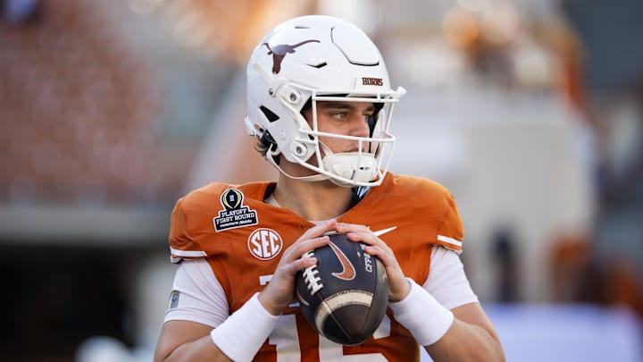 Dec 21, 2024; Austin, Texas, USA; Texas Longhorns quarterback Arch Manning (16) against the Clemson Tigers during the CFP National playoff first round at Darrell K Royal-Texas Memorial Stadium. Mandatory Credit: Mark J. Rebilas-Imagn Images