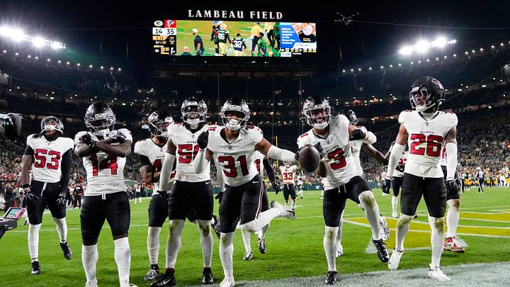 Sep 24, 2026; Green Bay, Wisconsin, USA;  The Atlanta Falcons defense celebrates following an interception during the fourth quarter against the Green Bay Packers at Lambeau Field. Mandatory Credit: Jeff Hanisch-Imagn Images