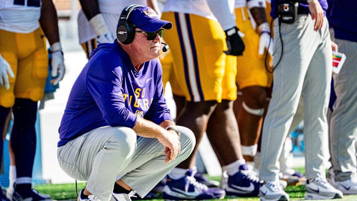 LSU head coach Brian Kelly crouches on the sidelines during a college football game between Ole Miss and LSU at Vaught-Hemingway Stadium in Oxford, Miss., on Saturday, Sept. 27, 2025. LSU head coach Brian Kelly crouches on the sidelines during a college football game between Ole Miss and LSU at Vaught-Hemingway Stadium in Oxford, Miss., on Saturday, Sept. 27, 2025.