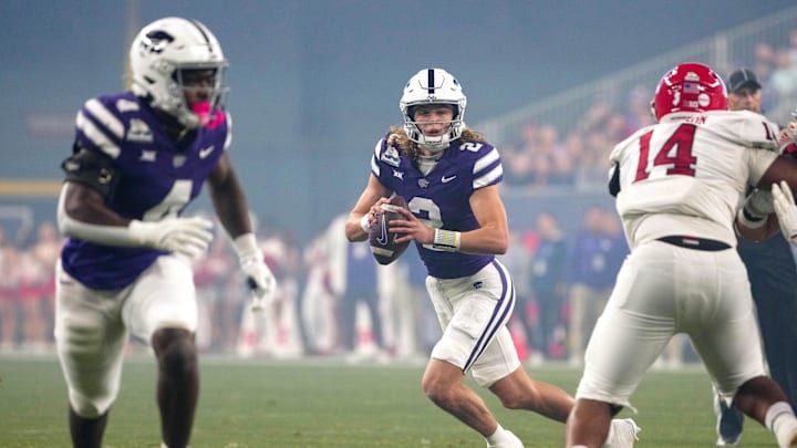 Kansas State quarterback Avery Johnson (2) looks for receivers against Rutgers during first half of the Rate Bowl at Chase Field on Dec. 26, 2024, Phoenix.