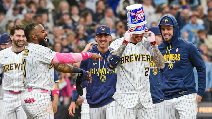 May 10, 2026; Milwaukee, Wisconsin, USA; Milwaukee Brewers second baseman Brice Turang (2) celebrates with teammates after hitting a game winning home run in the ninth inning against the New York Yankees at American Family Field. Mandatory Credit: Benny Sieu-Imagn Images