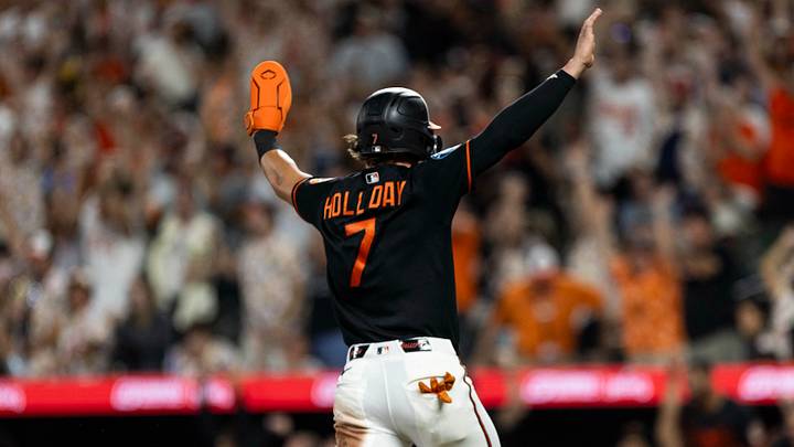 Jul 25, 2026; Baltimore, Maryland, USA; Baltimore Orioles second baseman Jackson Holliday (7) with the winning run after Baltimore Orioles right fielder Dylan Beavers (12) gets a single at the bottom of the ninth against the Atlanta Braves at Oriole Park at Camden Yards. Mandatory Credit: Lexi Thompson-Imagn Images Jul 25, 2026; Baltimore, Maryland, USA; Baltimore Orioles second baseman Jackson Holliday (7) with the winning run after Baltimore Orioles right fielder Dylan Beavers (12) gets a single at the bottom of the ninth against the Atlanta Braves at Oriole Park at Camden Yards. Mandatory Credit: Lexi Thompson-Imagn Images