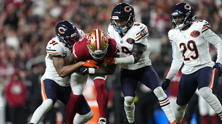 Dec 28, 2025; Santa Clara, California, USA;  Chicago Bears safety Kevin Byard III (31) and safety Jaquan Brisker (9) tackle San Francisco 49ers running back Brian Robinson Jr. (3) in the first half at Levi's Stadium. Mandatory Credit: Kyle Terada-Imagn Images