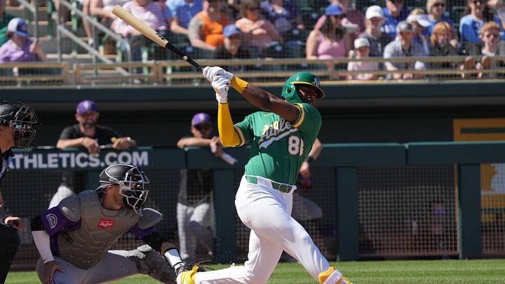 Mar 6, 2026; Mesa, Arizona, USA; Athletics shortstop Leo de Vries (83) hits against the Colorado Rockies in the second inning at Hohokam Stadium. Mandatory Credit: Rick Scuteri-Imagn Images Mar 6, 2026; Mesa, Arizona, USA; Athletics shortstop Leo de Vries (83) hits against the Colorado Rockies in the second inning at Hohokam Stadium. Mandatory Credit: Rick Scuteri-Imagn Images