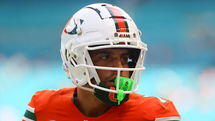 Sep 14, 2024; Miami Gardens, Florida, USA; Miami Hurricanes wide receiver Xavier Restrepo (7) looks on from the field before the game against the Ball State Cardinals at Hard Rock Stadium. Mandatory Credit: Sam Navarro-Imagn Images