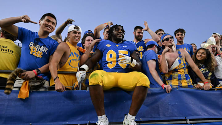 Sep 14, 2024; Pittsburgh, Pennsylvania, USA; Pittsburgh Panthers defensive lineman Francis Brewu (95) celebrates after defeating the West Virginia Mountaineers at Acrisure Stadium. Mandatory Credit: Barry Reeger-Image Images