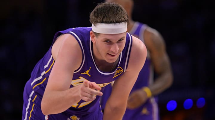 Feb 5, 2026; Los Angeles, California, USA;  Los Angeles Lakers guard Austin Reaves (15) reacts after a foul in the second half against the Philadelphia 76ers at Crypto.com Arena. Mandatory Credit: Jayne Kamin-Oncea-Imagn Images