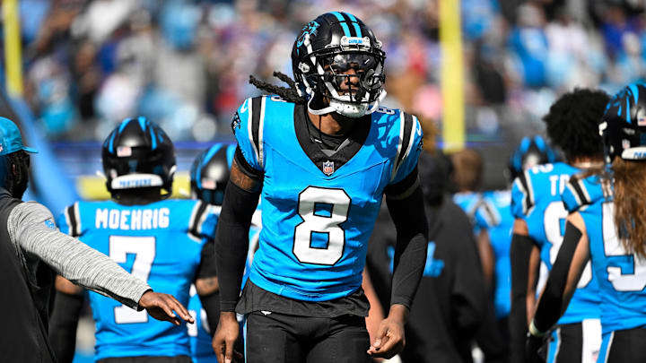 Oct 26, 2025; Charlotte, North Carolina, USA; Carolina Panthers cornerback Jaycee Horn (8) runs on to the field before the game at Bank of America Stadium. Mandatory Credit: Bob Donnan-Imagn Images