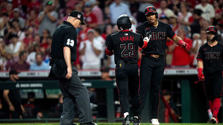Cincinnati Reds center fielder TJ Friedl (29) and Cincinnati Reds third baseman Noelvi Marte (16) greet each other at home plate in the sixth inning between Cincinnati Reds and Tampa Bay Rays at Great American Ball Park in Cincinnati on July 25, 2025. Cincinnati Reds center fielder TJ Friedl (29) and Cincinnati Reds third baseman Noelvi Marte (16) greet each other at home plate in the sixth inning between Cincinnati Reds and Tampa Bay Rays at Great American Ball Park in Cincinnati on July 25, 2025.