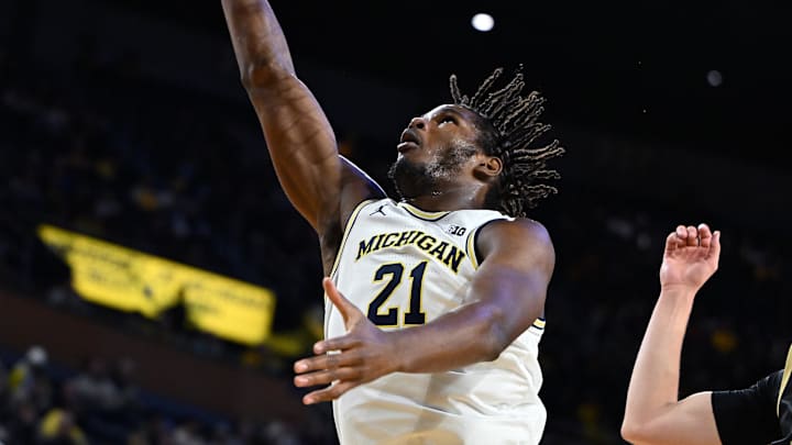 Nov 3, 2025; Ann Arbor, Michigan, USA; Michigan Wolverines forward Morez Johnson Jr. (21) shoots a layup against Oakland Golden Grizzlies in the second half at Crisler Center. Mandatory Credit: Lon Horwedel-Imagn Images
