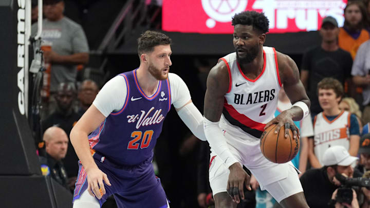 Nov 21, 2023; Phoenix, Arizona, USA; Portland Trail Blazers center Deandre Ayton (2) dribbles against Phoenix Suns center Jusuf Nurkic (20) during the first half at Footprint Center. Mandatory Credit: Joe Camporeale-Imagn Images Nov 21, 2023; Phoenix, Arizona, USA; Portland Trail Blazers center Deandre Ayton (2) dribbles against Phoenix Suns center Jusuf Nurkic (20) during the first half at Footprint Center. Mandatory Credit: Joe Camporeale-Imagn Images