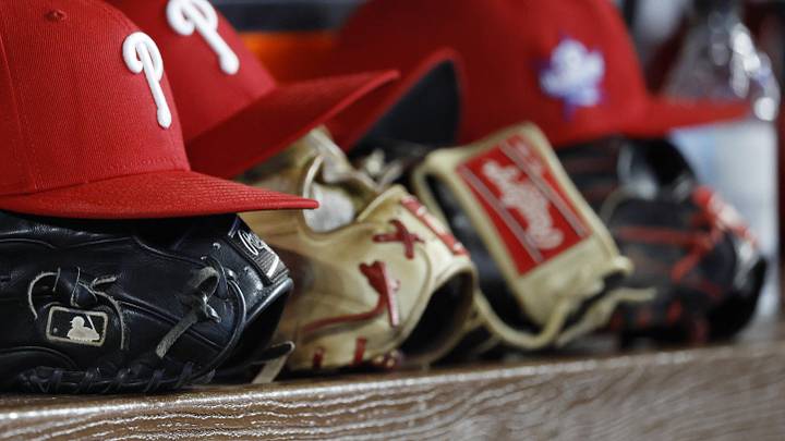 May 2, 2026; Miami, Florida, USA;  Philadelphia Phillies starting hats and gloves sit on the bench against the Miami Marlins during the fifth inning at loanDepot Park. 