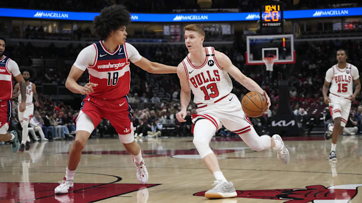 Apr 11, 2025; Chicago, Illinois, USA; Washington Wizards forward Kyshawn George (18) defends Chicago Bulls guard Kevin Huerter (13) during the first quarter at United Center. Mandatory Credit: David Banks-Imagn Images Apr 11, 2025; Chicago, Illinois, USA; Washington Wizards forward Kyshawn George (18) defends Chicago Bulls guard Kevin Huerter (13) during the first quarter at United Center. Mandatory Credit: David Banks-Imagn Images