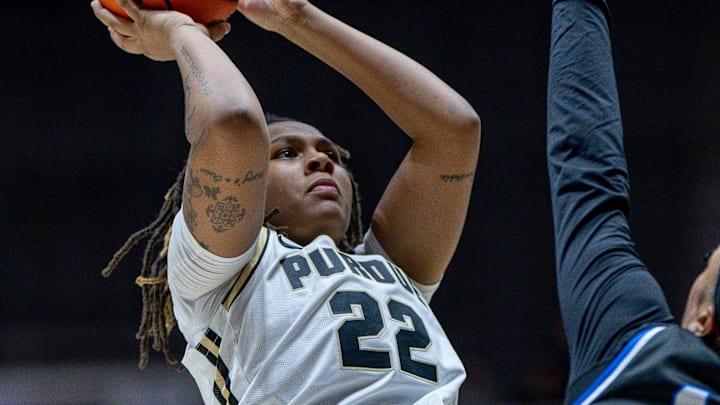 Purdue Sophomore Kendall Puryear (22) shoots a jumper 