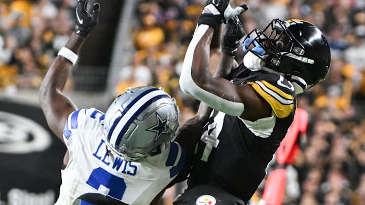 Oct 6, 2024; Pittsburgh, Pennsylvania, USA; Pittsburgh Steelers wide receiver George Pickens (14 )is unable to catch a pass while being defended by Dallas Cowboys cornerback Jourdan Lewis (2) during the second quarter at Acrisure Stadium. Mandatory Credit: Barry Reeger-Imagn Imag