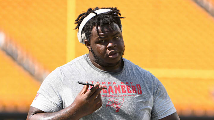 Aug 16, 2025; Pittsburgh, Pennsylvania, USA; Tampa Bay Buccaneers defensive tackle Desmond Watson walks laps before a game against the Pittsburgh Steelers at Acrisure Stadium. Mandatory Credit: Barry Reeger-Imagn Images