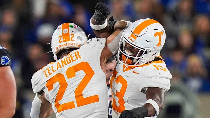 Tennessee linebacker Jeremiah Telander (22) and Tennessee linebacker Edwin Spillman (13) celebrate after a tackle during a NCAA football game against Kentucky at Kroger Field in Lexington, Kentucky on Oct. 25, 2025. Tennessee linebacker Jeremiah Telander (22) and Tennessee linebacker Edwin Spillman (13) celebrate after a tackle during a NCAA football game against Kentucky at Kroger Field in Lexington, Kentucky on Oct. 25, 2025.