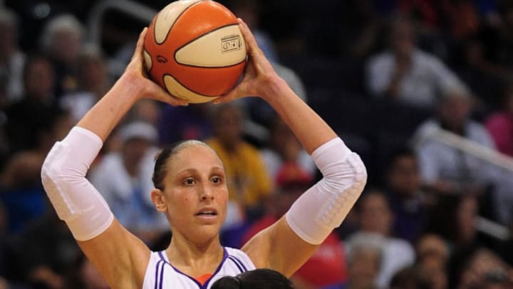 Aug 26, 2010; Phoenix, AZ, USA; Phoenix Mercury guard Diana Taurasi (3) handles the ball against the San Antonio Silver Stars guard Edwige Lawson-Wade (9) during the first half in game one of the Western Conference semi-finals in the 2010 WNBA playoffs at US Airways Center.  The Mercury defeated the Silver Stars 106-93.  Mandatory Credit: Jennifer Stewart-Imagn Images