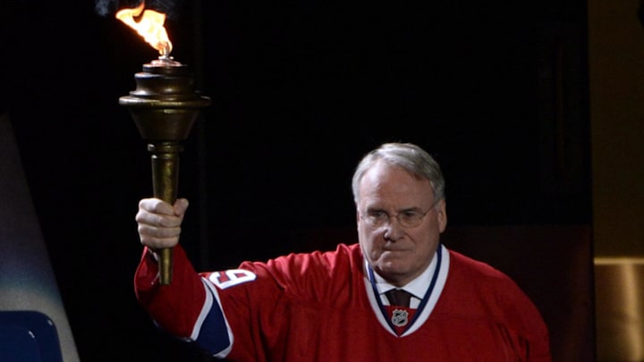 Oct 16, 2014; Montreal, Quebec, CAN; Canadiens former goalie Ken Dryden brings the torch before the game between the Boston Bruins and the Montreal Canadiens at the Bell Centre. Mandatory Credit: Eric Bolte-Imagn Images