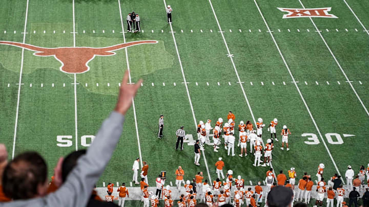 Texas fans cheer during the game against Texas Tech at Darrell K Royal Texas Memorial Stadium.